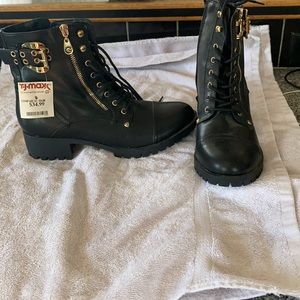 Black boot with gold zipper and buckle by Guess